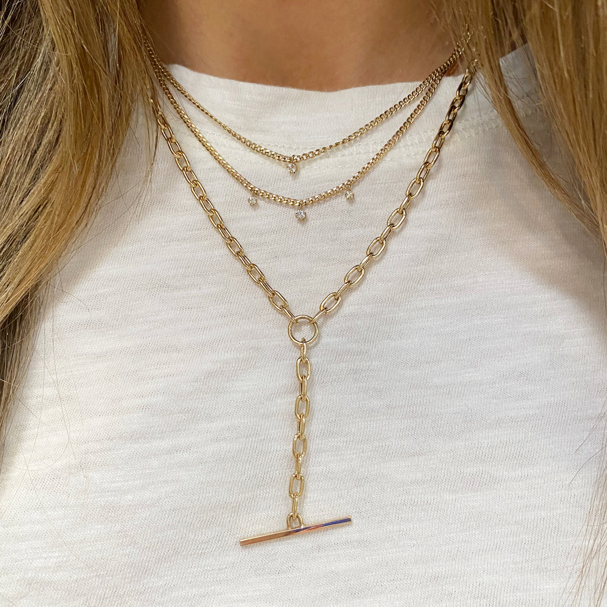 Thin gold chain necklace with small best sale diamond